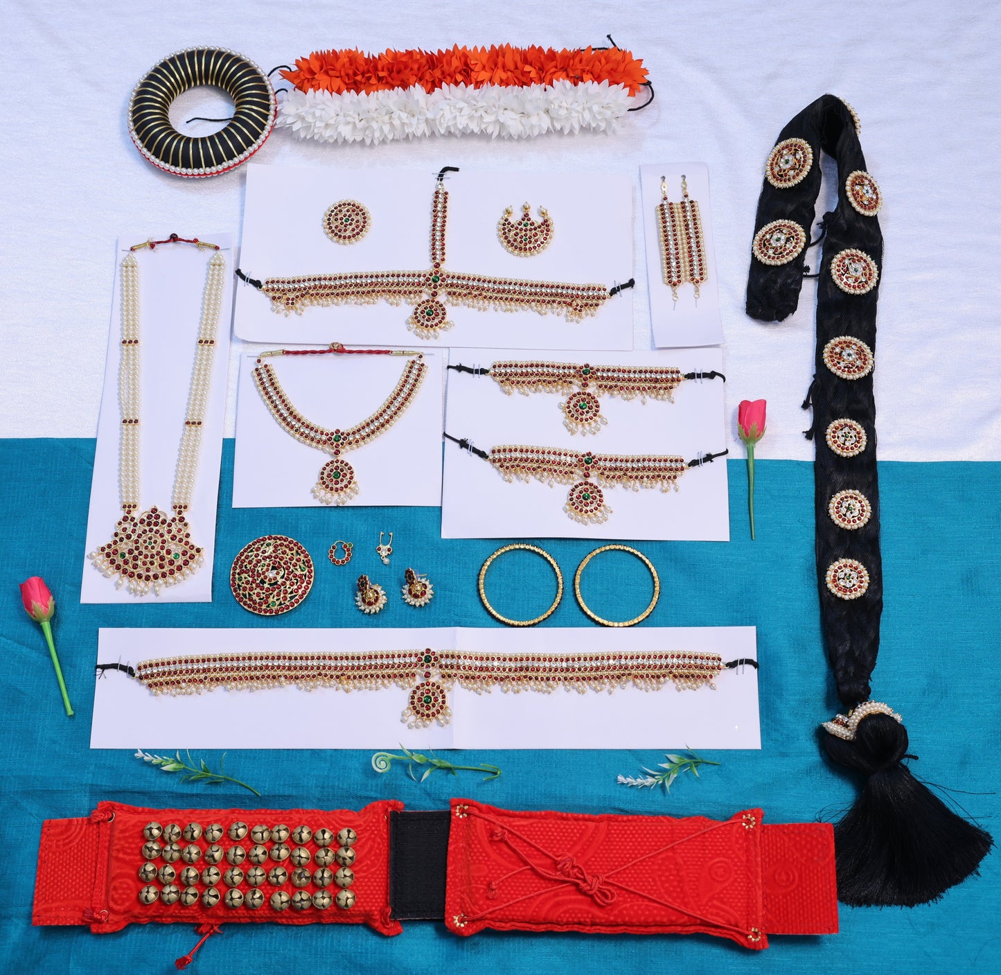 Bharatanatyam dance accessories including salangai and hair braid ornaments