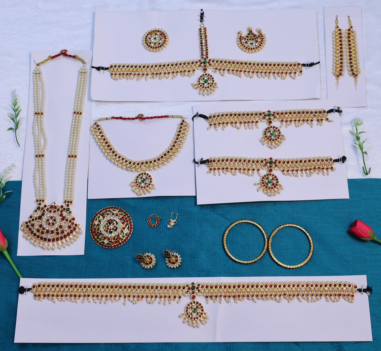 Traditional Kemp jewelry for classical dance – gold-toned necklace, earrings, and hairpieces with red and green stones, ideal for Bharatanatyam and Kuchipudi dancers