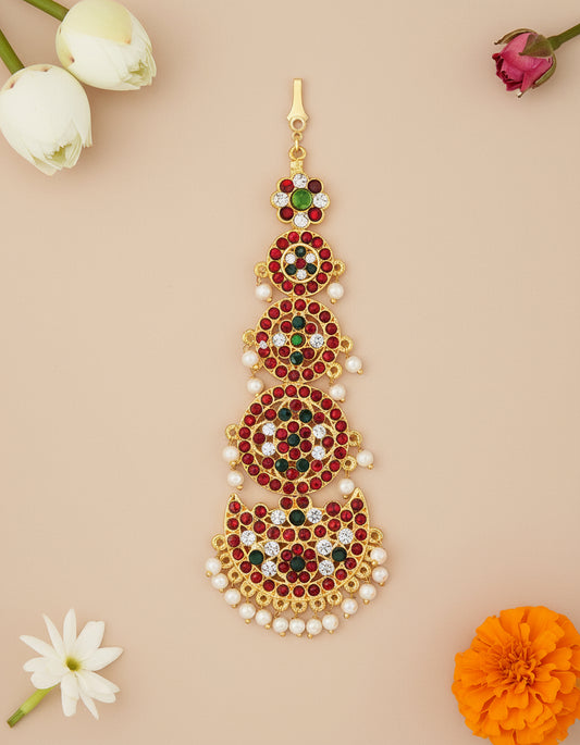 Bharatanatyam dancer wearing Temple Kemp Nethi Chutti