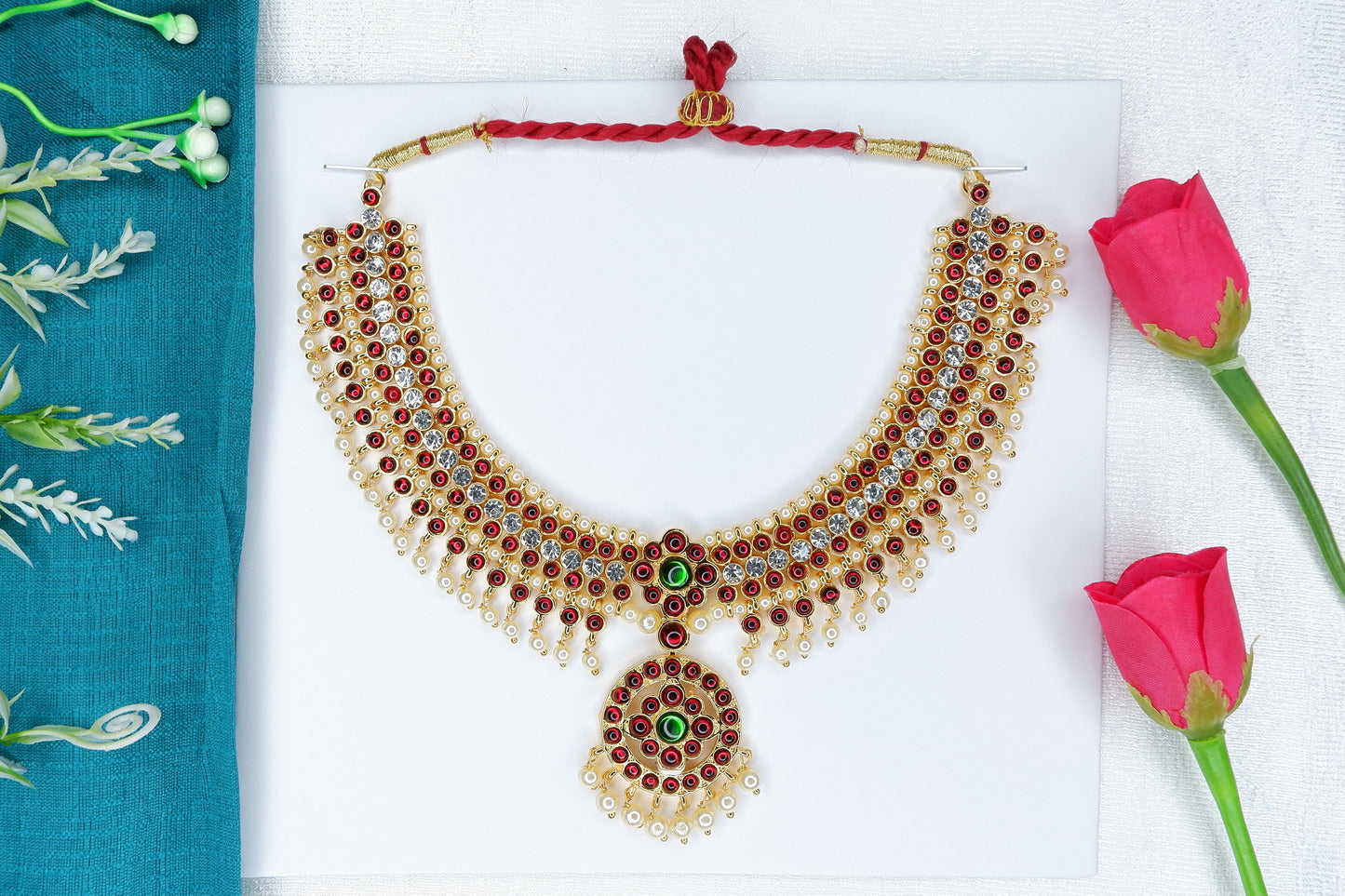 Short temple jewellery necklace used in Bharatanatyam and Kuchipudi, crafted with ornate gold patterns.