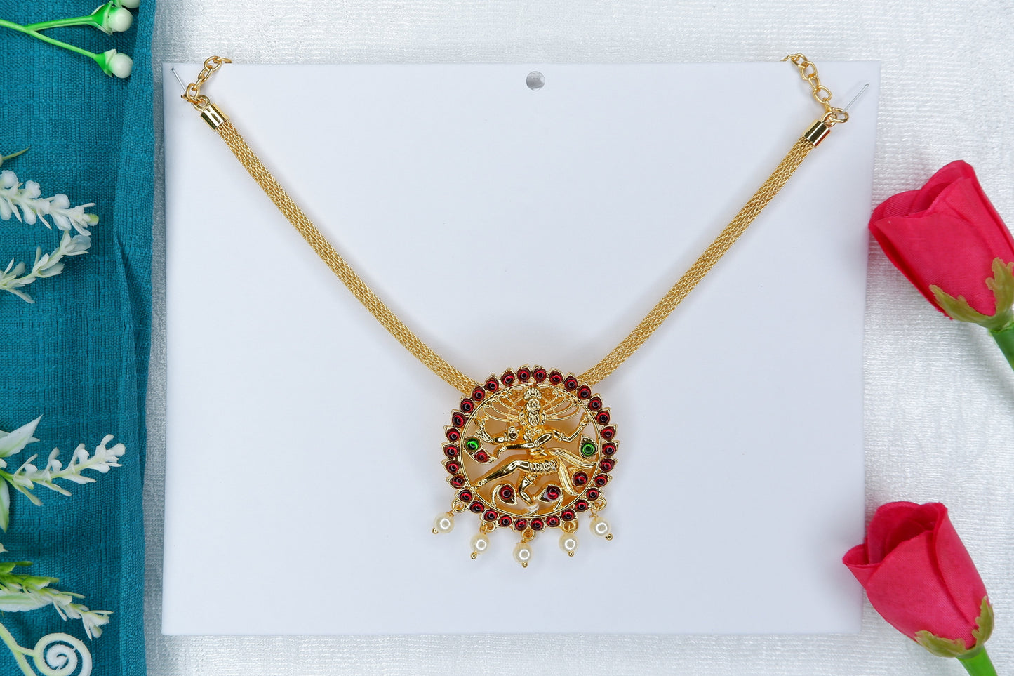 Short Indian classical dance necklace with a central Nataraj pendant and ornate gold-toned temple jewelry design, typically worn in Bharatanatyam and Kuchipudi performances