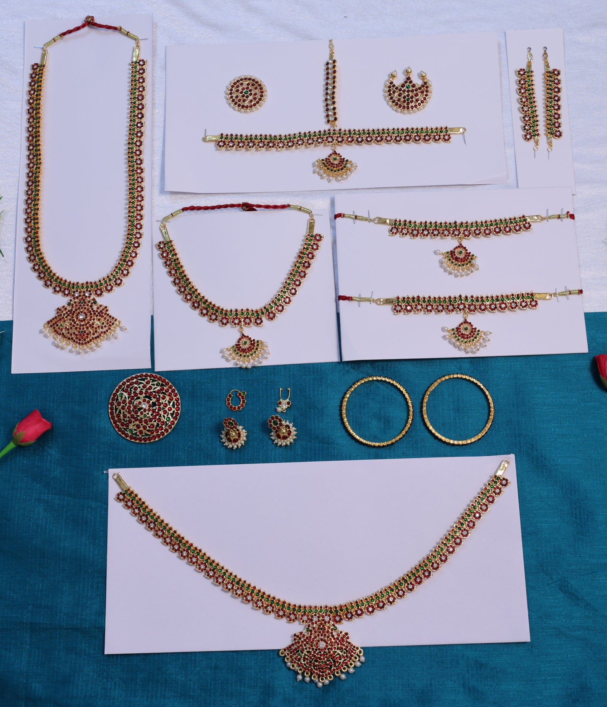 Traditional Bharatanatyam temple jewellery set with red and green stones