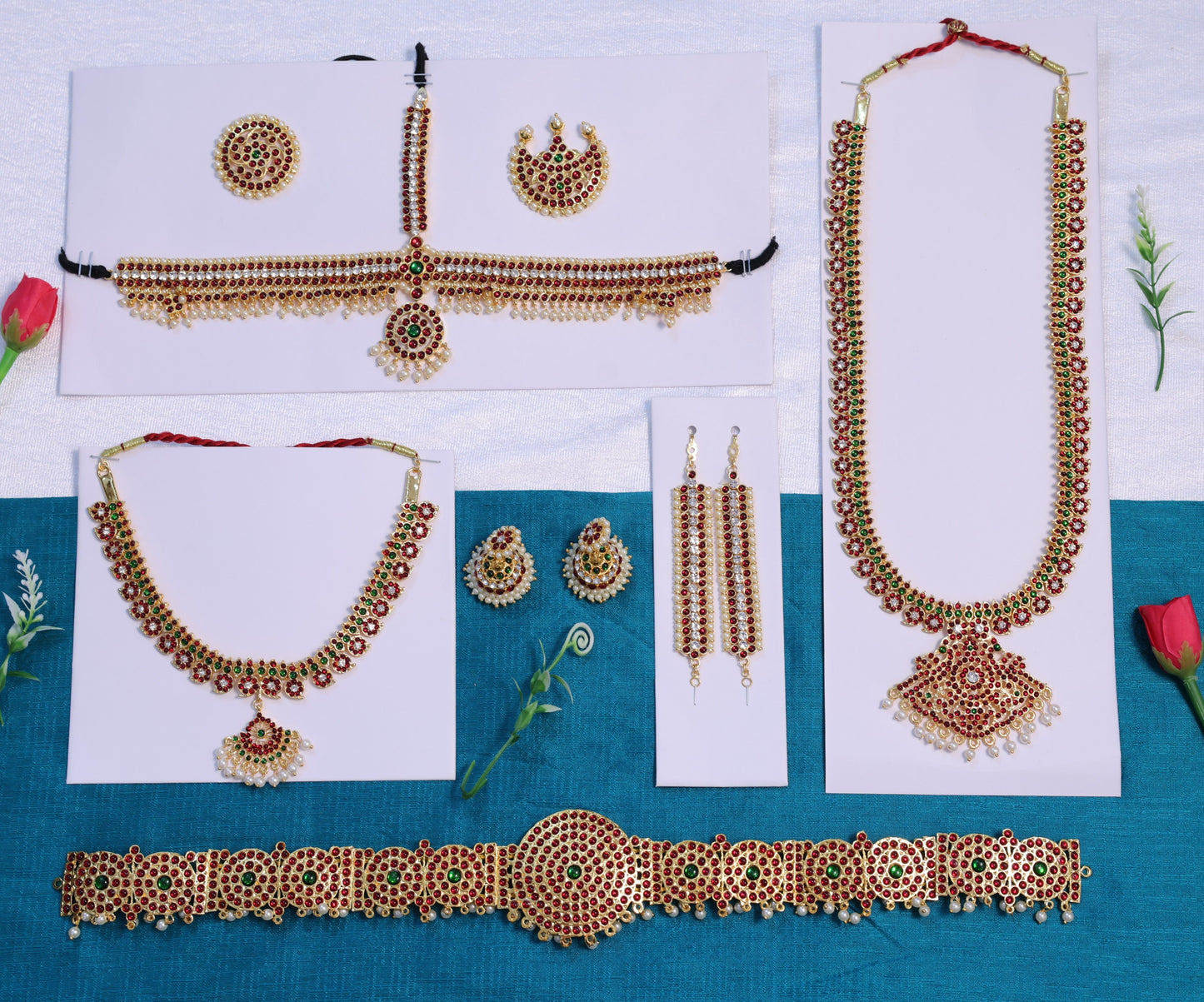 Bharatanatyam and Kuchipudi temple jewelry set with long haram, choker, oddiyanam belt, jhumkas, and headpiece in Kemp stones.