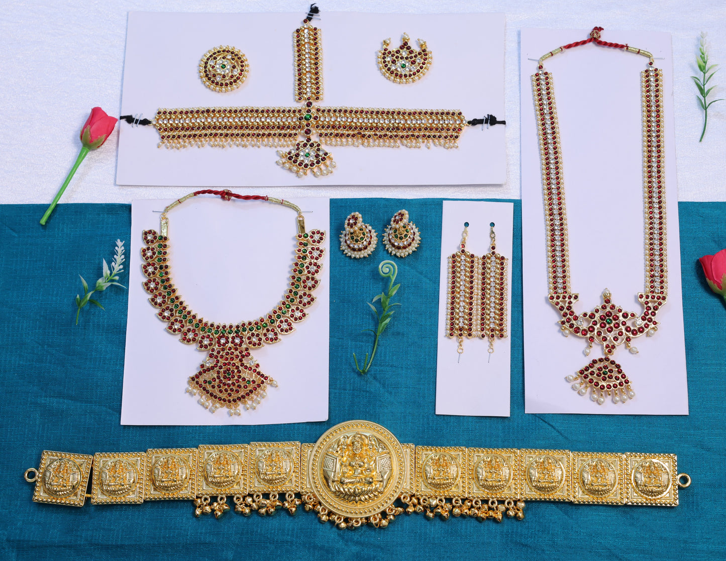 Full Bharatanatyam dance jewellery set with mango design long haram, short necklace, headpiece, jhumkas, earrings, and Lakshmi oddiyanam belt in temple jewellery style