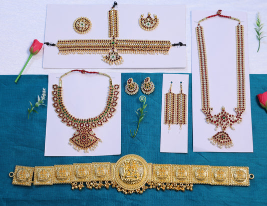 Full Bharatanatyam dance jewellery set with mango design long haram, short necklace, headpiece, jhumkas, earrings, and Lakshmi oddiyanam belt in temple jewellery style
