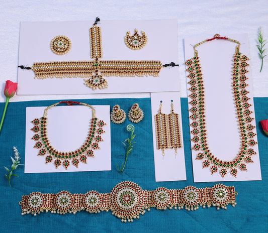 Complete Arangetram and Bharatanatyam temple jewellery set with long haram, choker, earrings, vanki, oddiyanam belt, mattal, and headpiece