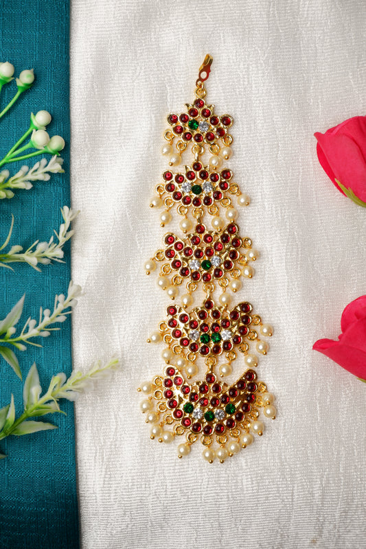 Classical Indian dancer adorned with Bharatanatyam mang tika and traditional dance makeup
