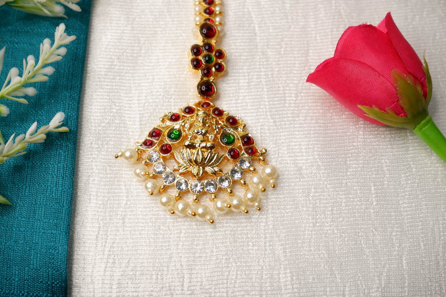 Detailed view of Bharatanatyam mang tika, a forehead ornament used in Indian classical dance