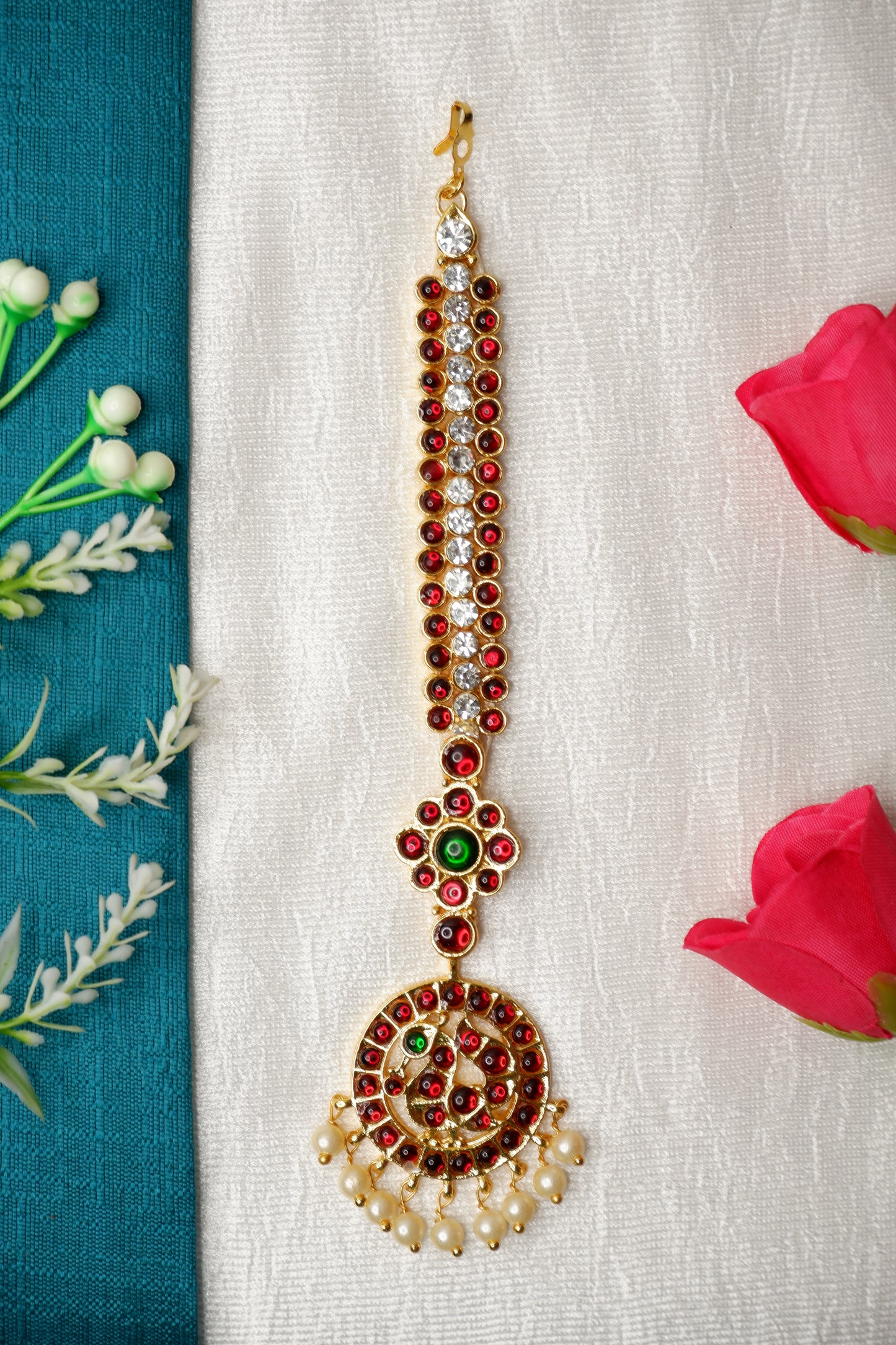 Kuchipudi nethi chutti
Traditional maang tikka
Kempu stones and pearls
Classical dance jewelry Gold plated