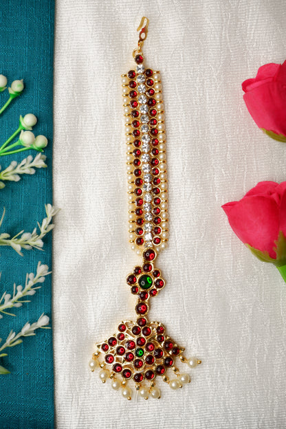 South Indian classical Bharatanatyam dancer highlighting intricate nethi chutti headpiece