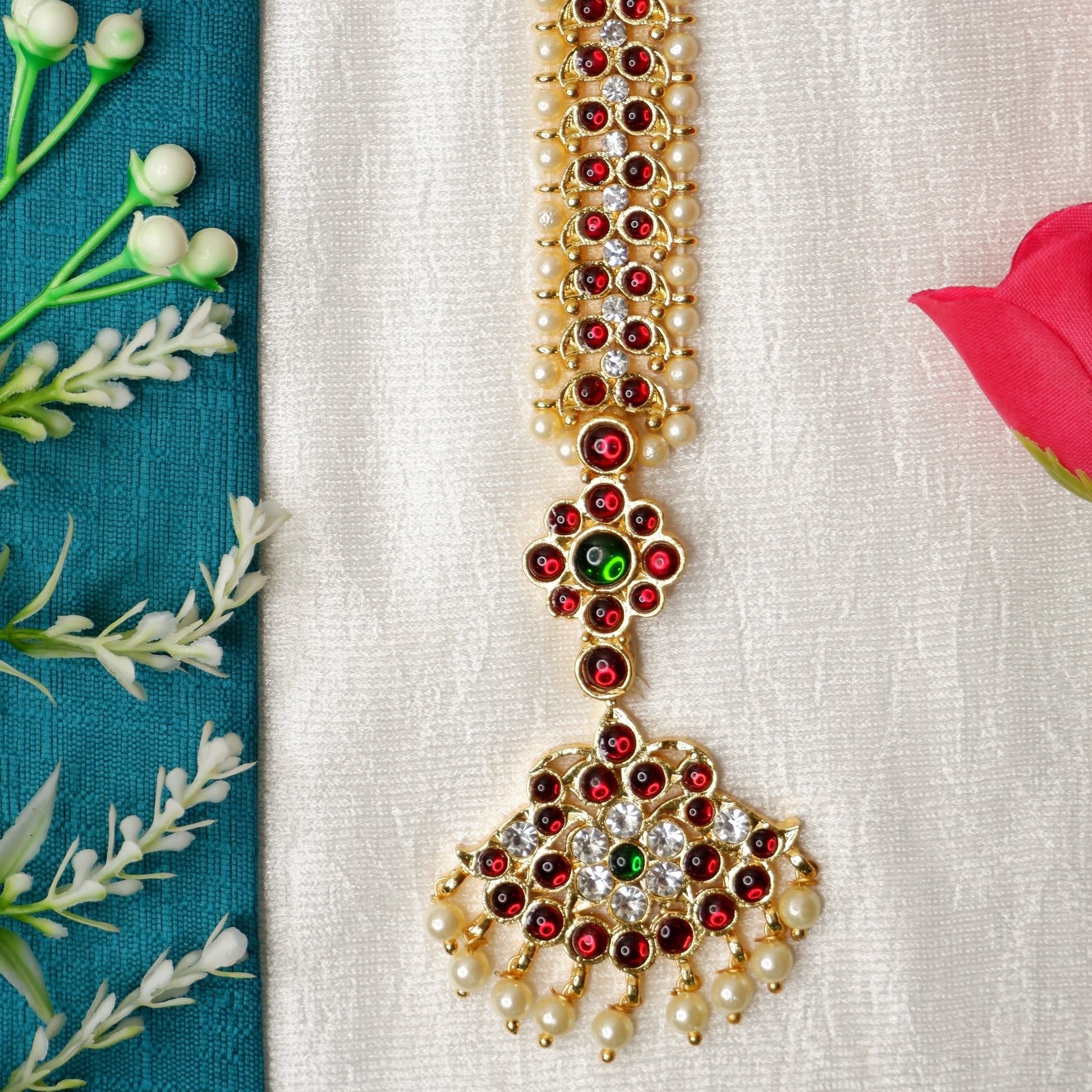 South Indian classical Bharatanatyam dancer highlighting intricate nethi chutti headpiece