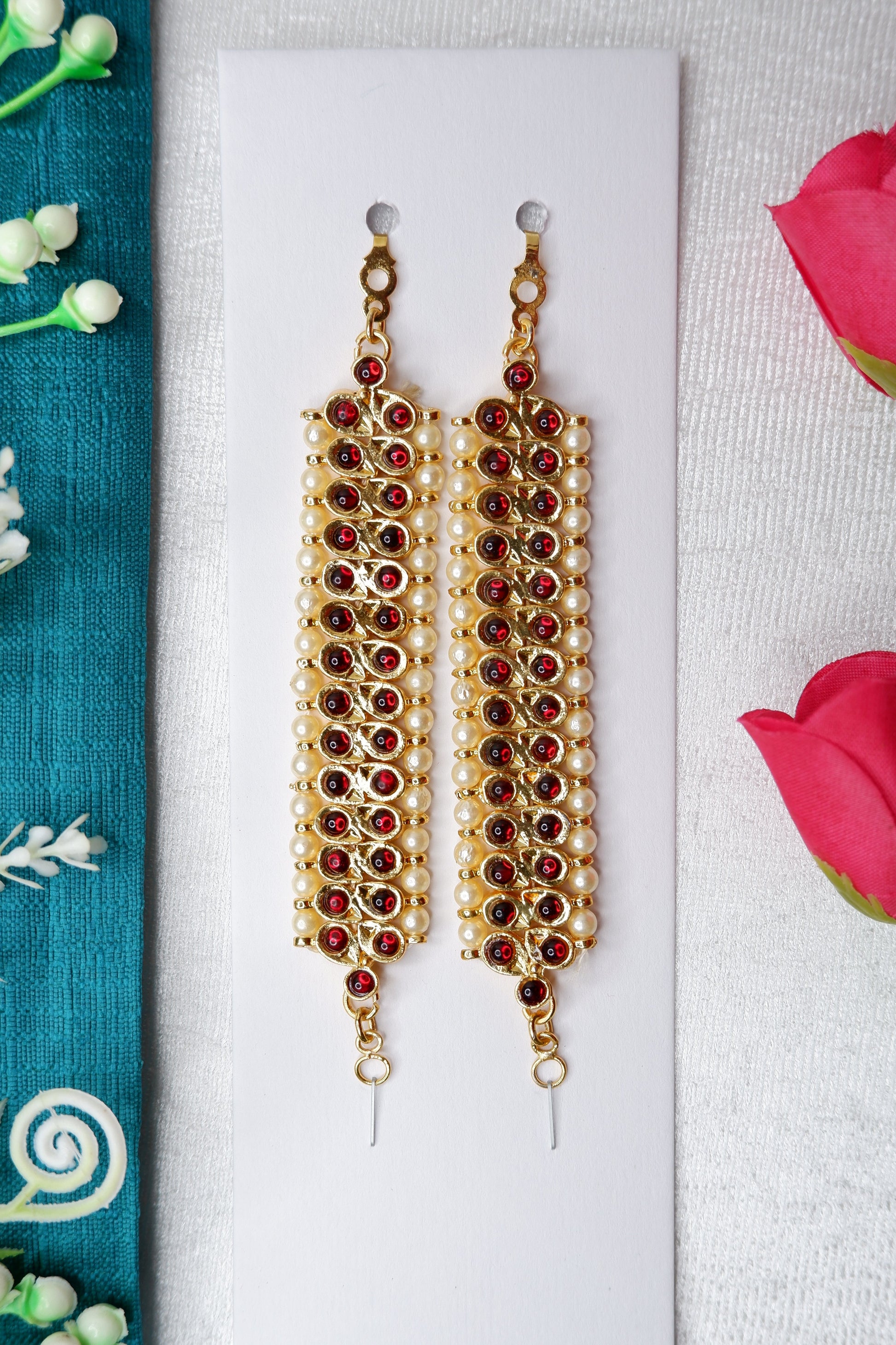 Traditional mattal arm bands for Bharatanatyam and Kuchipudi classical dance with kempu stones, pearls, and green accent stones in gold-toned temple jewelry design