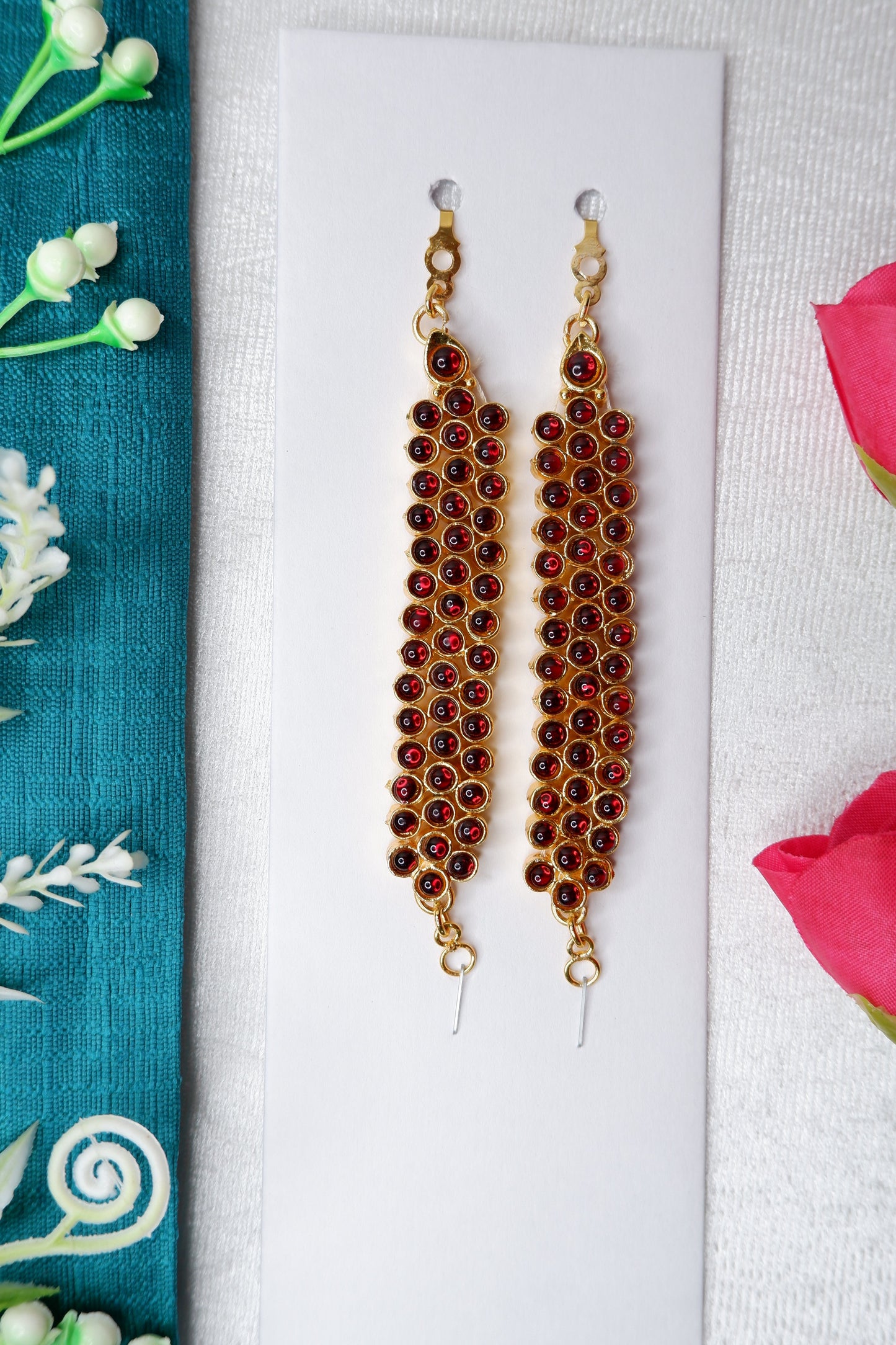 Elegant Bharatanatyam performance by Mattal, Indian classical dancer in temple jewelry and silk costume