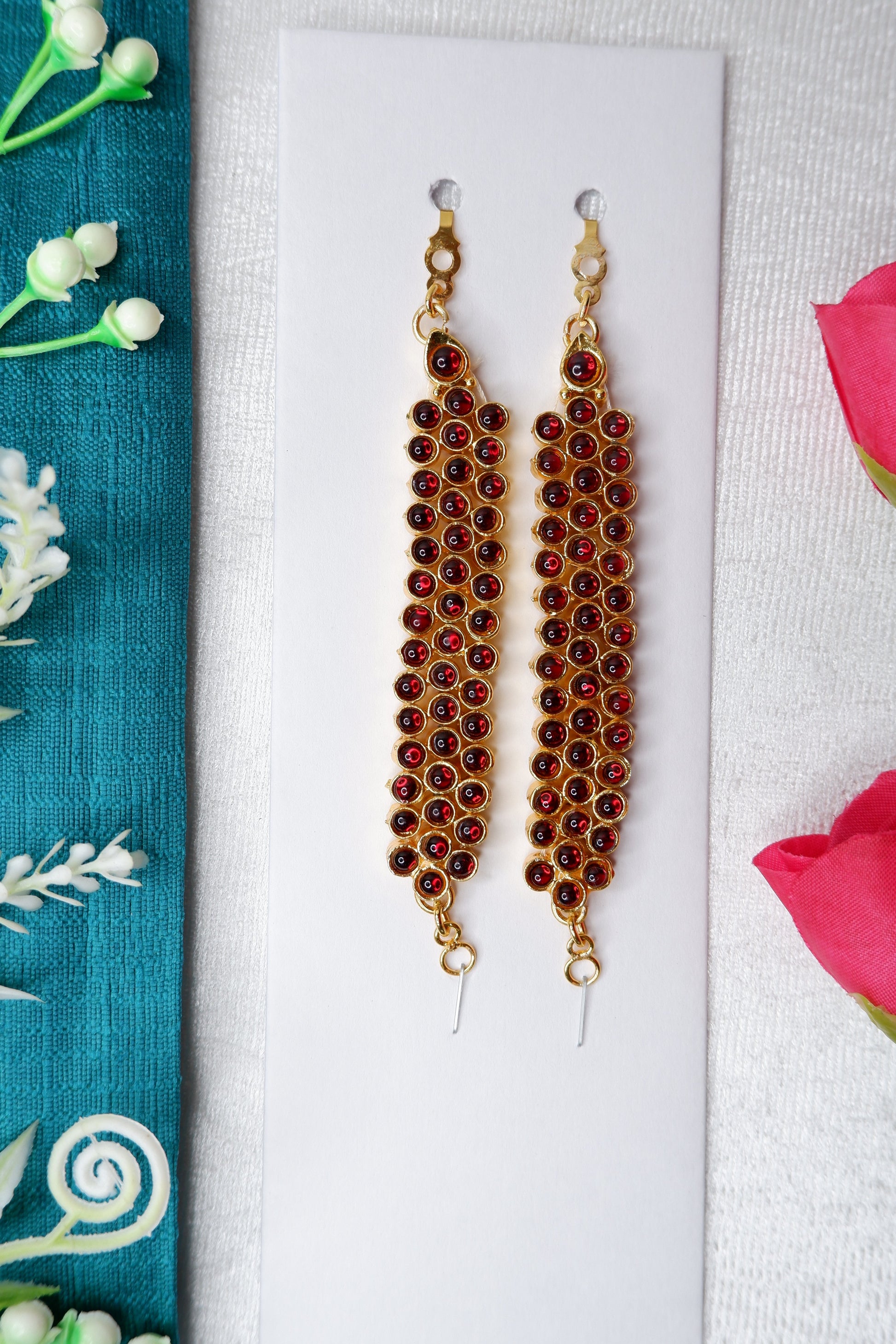Elegant Bharatanatyam performance by Mattal, Indian classical dancer in temple jewelry and silk costume