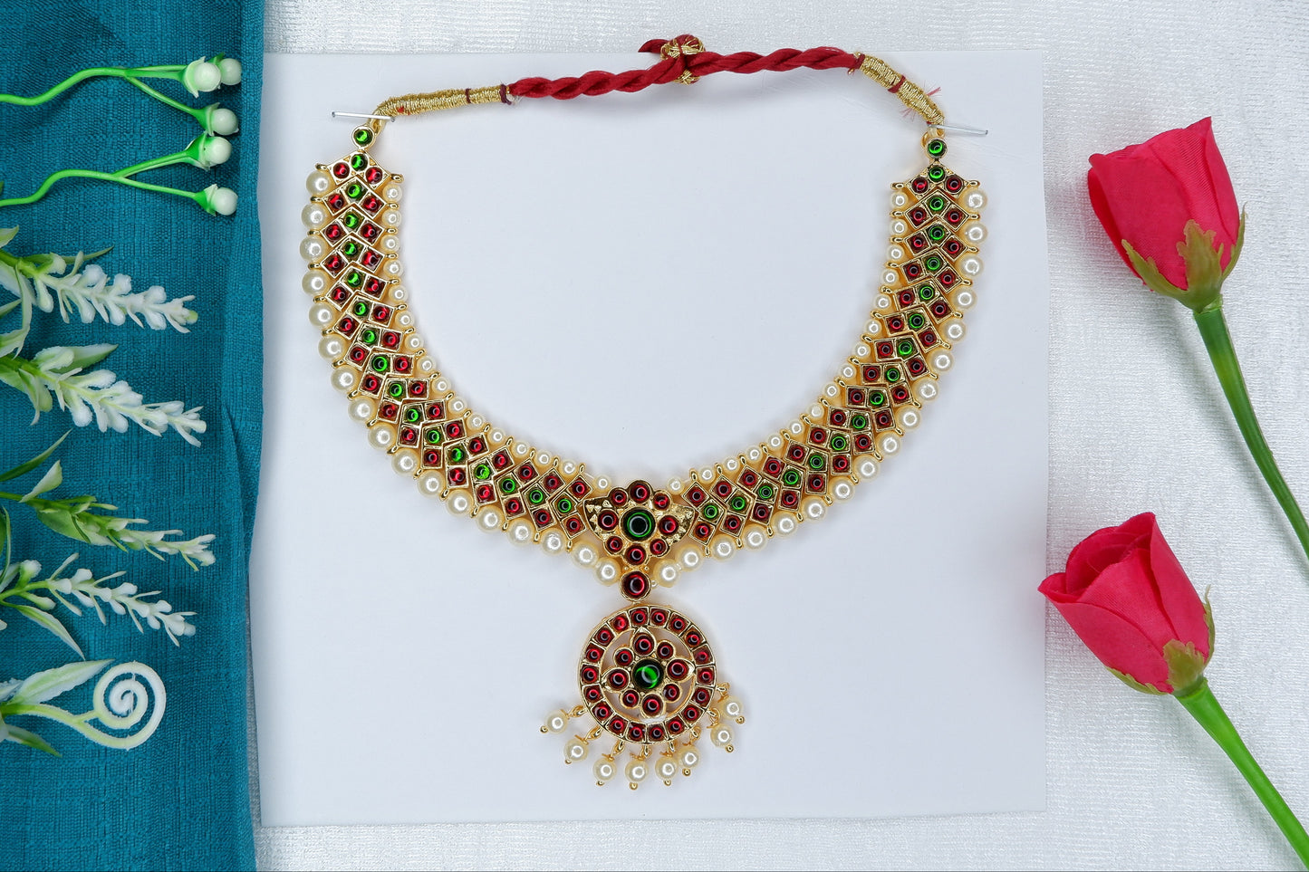 Short temple jewelry necklace used in Bharatanatyam and Kuchipudi dance, featuring gold-plated motifs and red stones