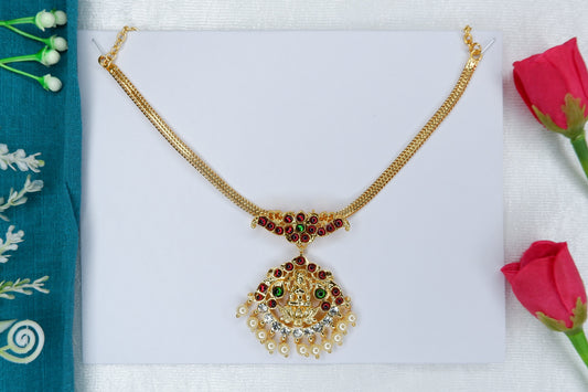Short temple jewelry necklace featuring a central Lakshmi motif, worn for Bharatanatyam and Kuchipudi classical dance