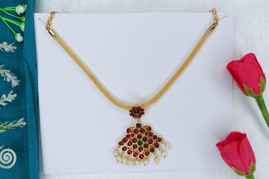 Short temple jewelry necklace featuring a central Lakshmi motif, worn for Bharatanatyam and Kuchipudi classical dance